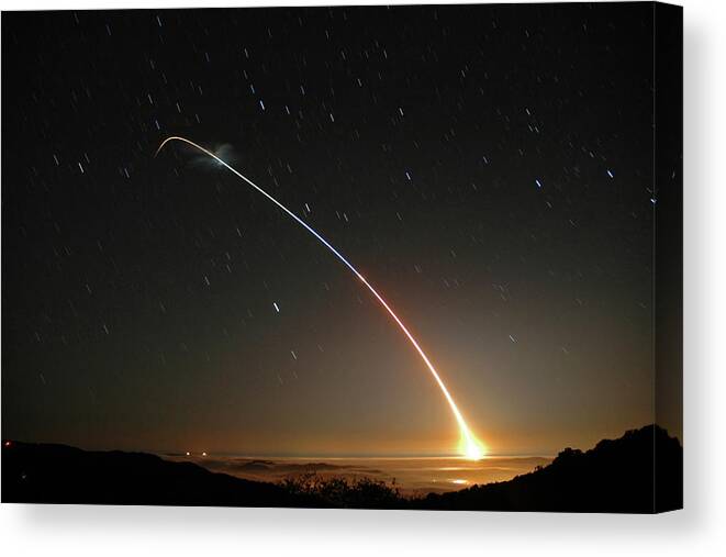 Rocket Canvas Print featuring the photograph LGM-118A Peacekeeper missile launch July 21 2004 by Brian Lockett