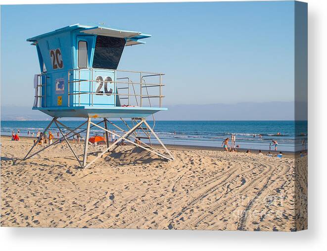 Blue Sky Canvas Print featuring the photograph Lifeguard Tower At The Beach In San by Dancestrokes