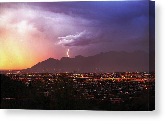 Lightning Canvas Print featuring the photograph Lightning bolt over the Santa Catalina Mountains and Tucson, Arizona by Chance Kafka
