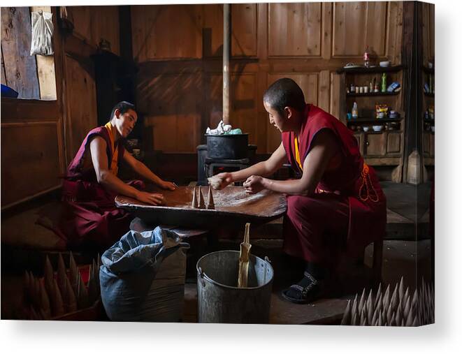 Tibetan Canvas Print featuring the photograph Little Lama Making Sacrificial Offerings by Yibing Nie