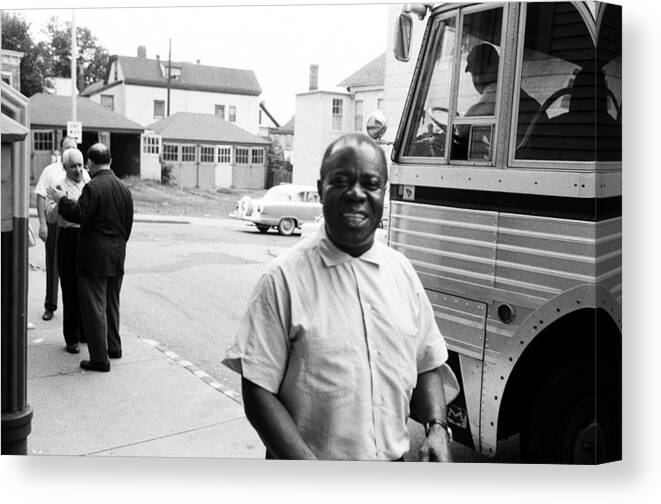 1950-1959 Canvas Print featuring the photograph Louis Armstrong Arrives At A Church by Michael Ochs Archives