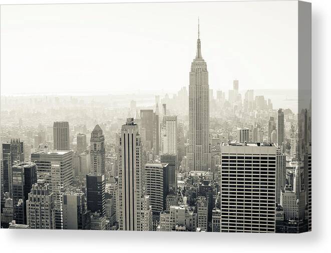 Tranquility Canvas Print featuring the photograph Manhattan by © Philippe Lejeanvre