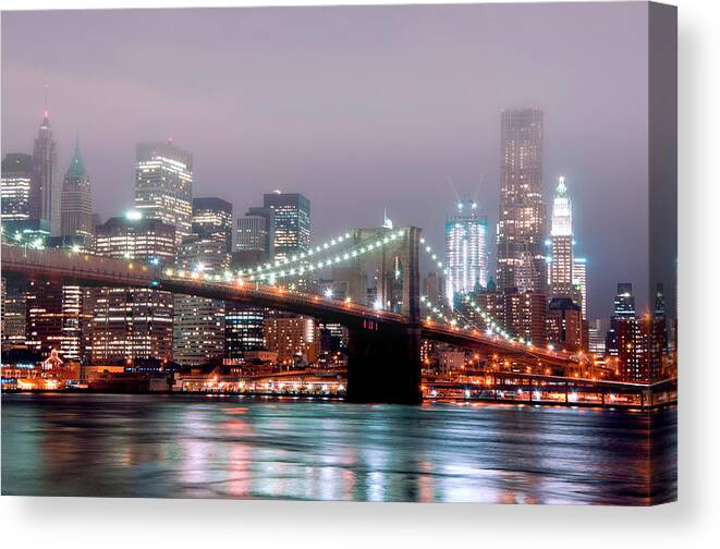 Suspension Bridge Canvas Print featuring the photograph Manhattan And Brooklyn Bridge Under Fog by Shobeir Ansari