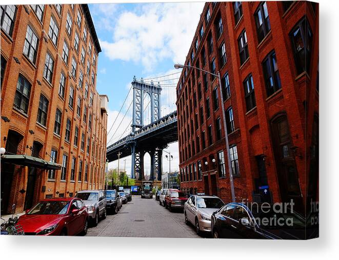 Usa Canvas Print featuring the photograph Manhattan Bridge Seen From A Red Brick by Youproduction