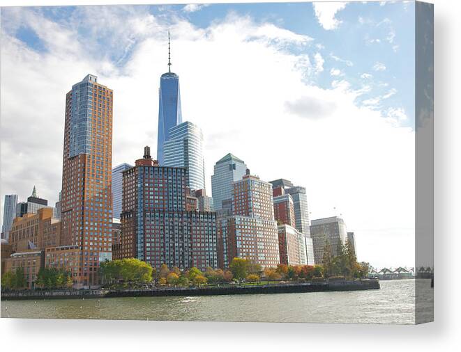 Battery Park Canvas Print featuring the photograph Modern Tall Buildings And Park In Fall by Barry Winiker