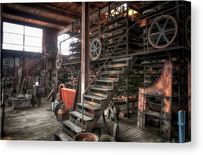 Industrial Heritage Museum Canvas Print featuring the photograph Mold Storage in the Forge by Susan Rissi Tregoning
