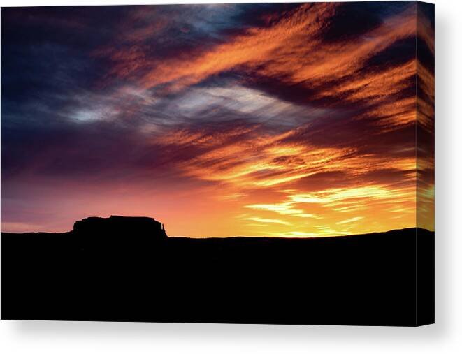 Monument Valley Canvas Print featuring the photograph Monument Valley Sunset by William Christiansen