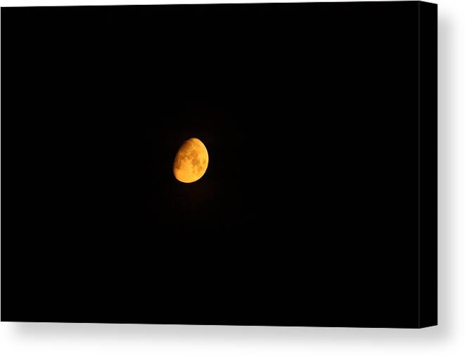 Moon Canvas Print featuring the photograph Moon in Orange by Jason Huffman