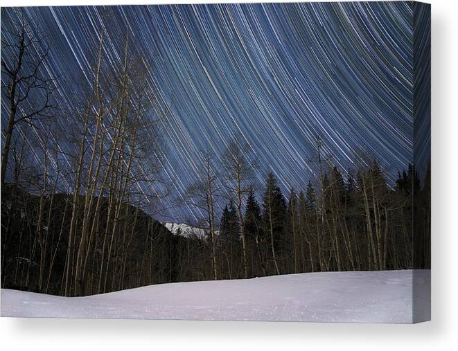 Star Trails Canvas Print featuring the photograph Moonlight in the Rockies by Ivan Franklin