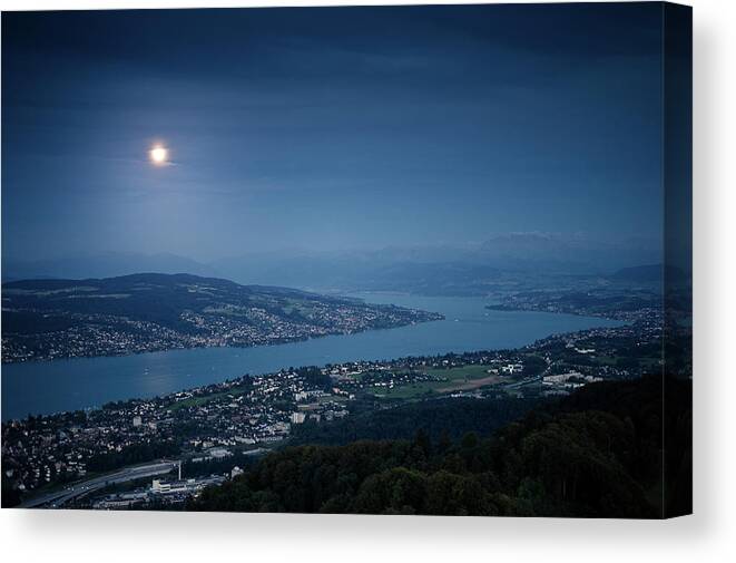 Scenics Canvas Print featuring the photograph Moonlight Over Lake by Tobias Gaulke