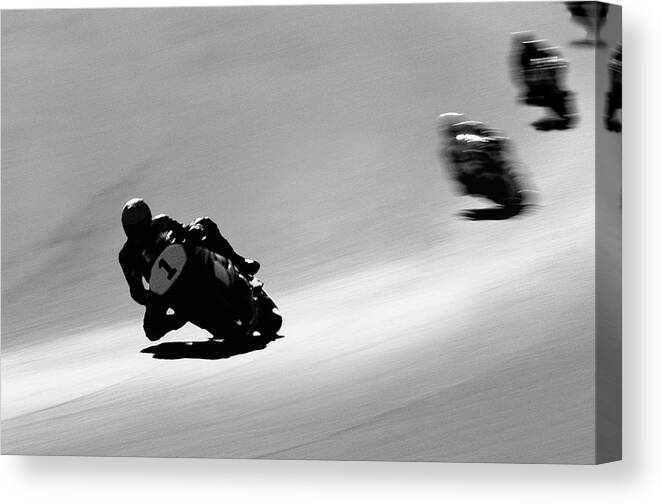 Crash Helmet Canvas Print featuring the photograph Motorcyclists Making Turn On Raceway by David Madison