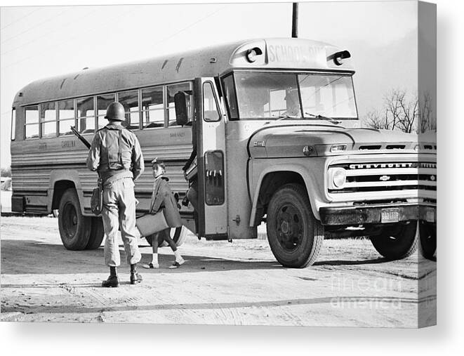 Rifle Canvas Print featuring the photograph National Guardsman Meeting School Bus by Bettmann