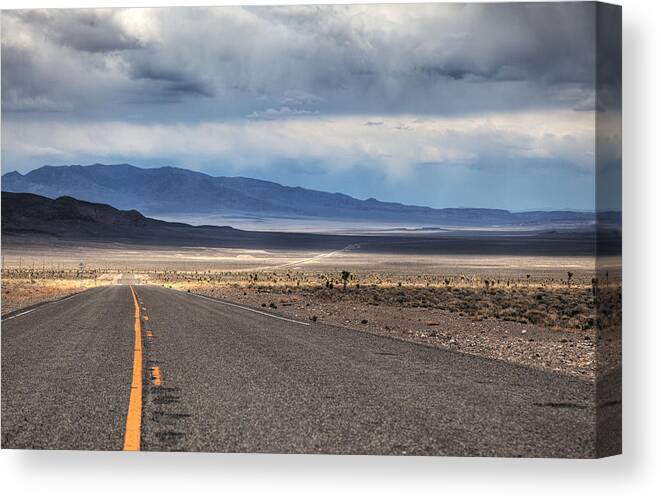Scenics Canvas Print featuring the photograph Nevada Highway by Bike maverick