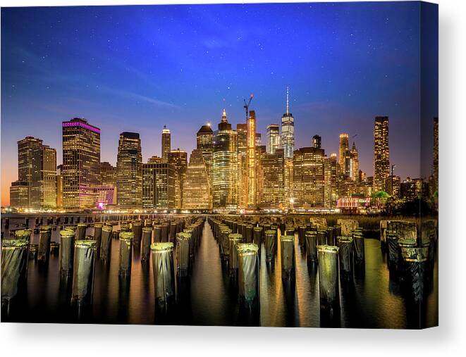New Canvas Print featuring the photograph Night Cityscape of New york city by Anek Suwannaphoom