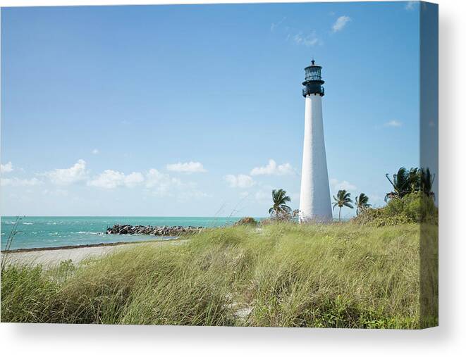 Grass Family Canvas Print featuring the photograph Ocean And Coast With Lighthouse by Inti St. Clair