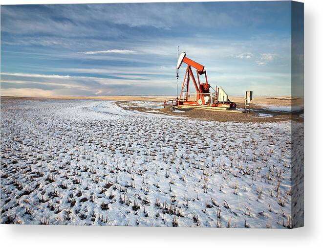 Scenics Canvas Print featuring the photograph Oil Pumpjack In Southern Alberta by Imaginegolf