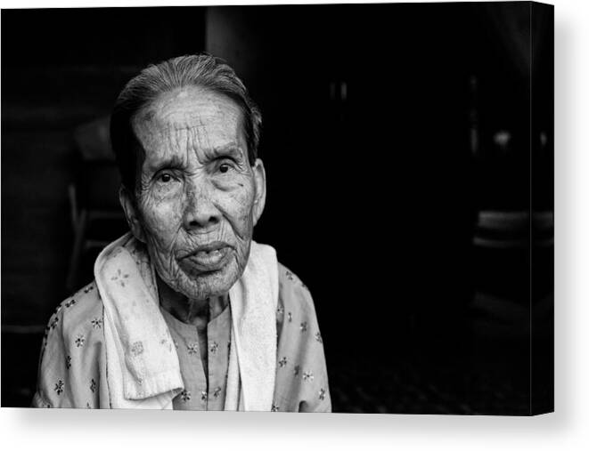 Documentary Canvas Print featuring the photograph Old Lady by Kieron Long
