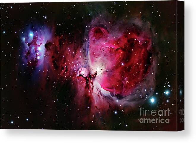 Orion Nebula Canvas Print featuring the photograph Orion Nebula and Running Man Nebula by Doc Braham