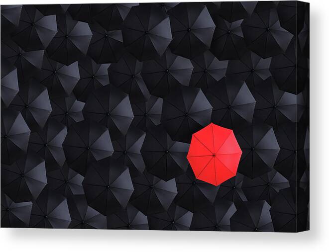 Hiding Canvas Print featuring the photograph Overhead View Of Many Umbrellas by Skodonnell