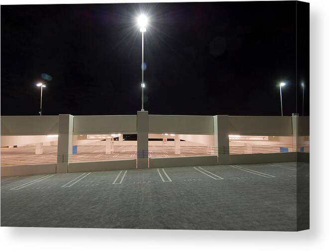 Empty Canvas Print featuring the photograph Parking Structure At Night by John Humble