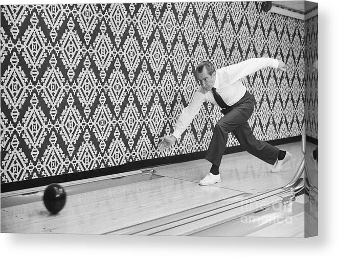 Releasing Canvas Print featuring the photograph President Nixon Bowling In White House by Bettmann