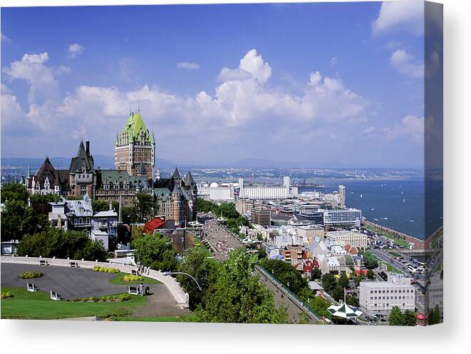 Downtown District Canvas Print featuring the photograph Quebec City Chateau Frontenac Hotel by Laughingmango