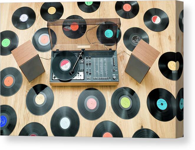 Music Canvas Print featuring the photograph Records Lying On Floor Surrounding by Jorg Greuel