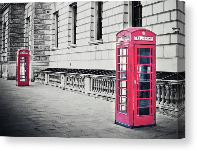 Pay Phone Canvas Print featuring the photograph Red English Phone Booths In Black And by Zodebala