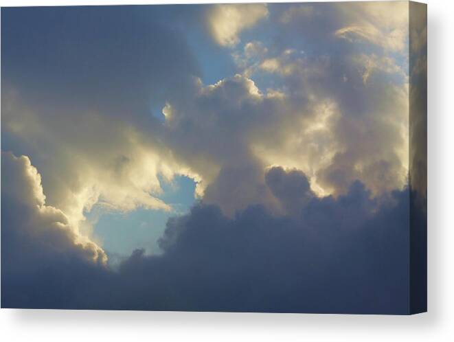 Clouds Canvas Print featuring the photograph Respite by Fred Bailey