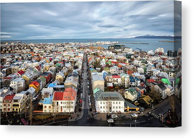 Hallgrimskirkja Canvas Print featuring the photograph Reykjavik City 1 by Nigel R Bell