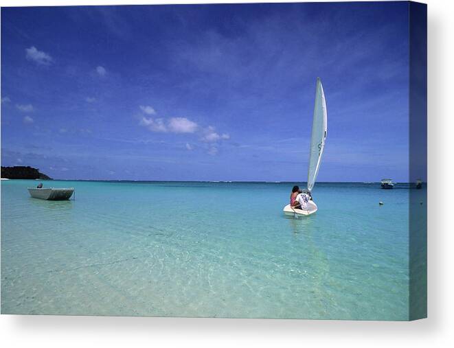 Water's Edge Canvas Print featuring the photograph Sailboat On Crystal Blue Water by Tammy616