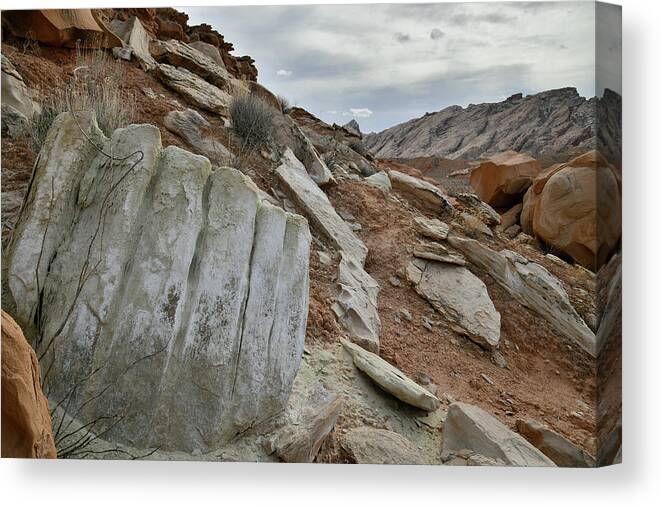 County Road 1028 Canvas Print featuring the photograph San Rafael Swell from I-70 in Utah by Ray Mathis