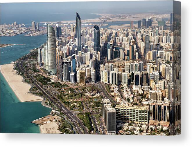 Arabia Canvas Print featuring the photograph Skyscrapers And Coastline In Abu Dhabi by Extreme-photographer