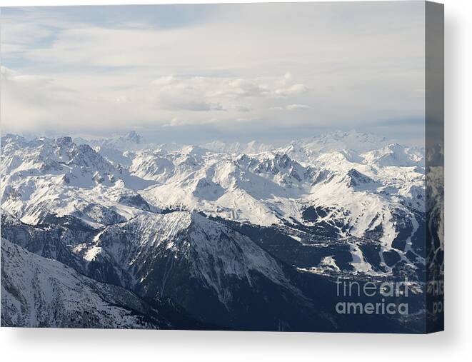 Mountains Canvas Print featuring the photograph Snow Covered Alps Mountains Aerial View by Ivan Aleshin