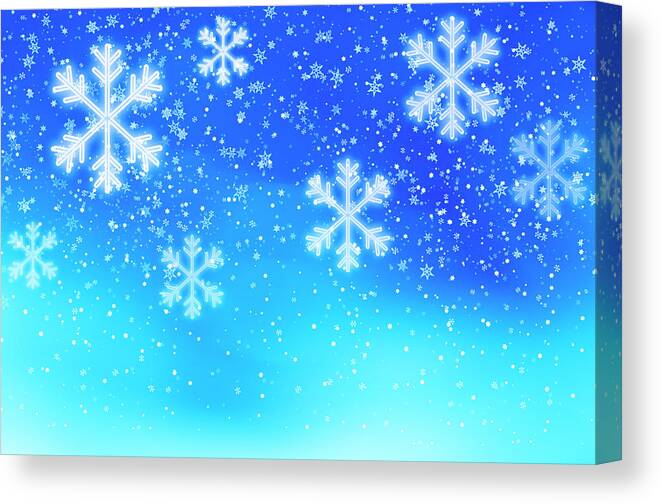 Backgrounds Canvas Print featuring the photograph Snowflakes On Blue Background, Studio by Tetra Images