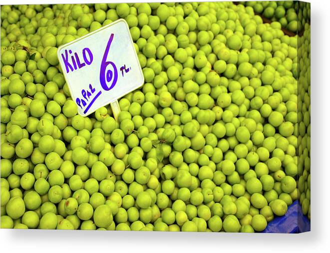 Canakkale Canvas Print featuring the photograph Sour green plums in the central market by Steve Estvanik