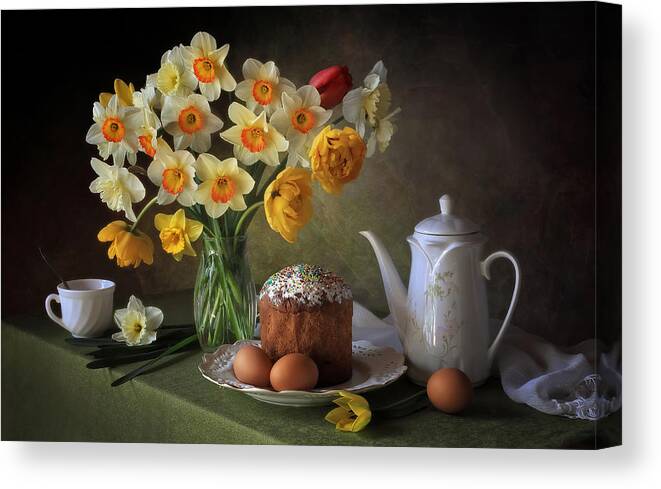  Canvas Print featuring the photograph Still Life With A Bouquet Of Daffodils And Easter Bread by Tatyana Skorokhod