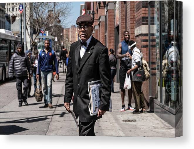 Streetphotography Canvas Print featuring the photograph Street Newsboy by Pablo Abreu