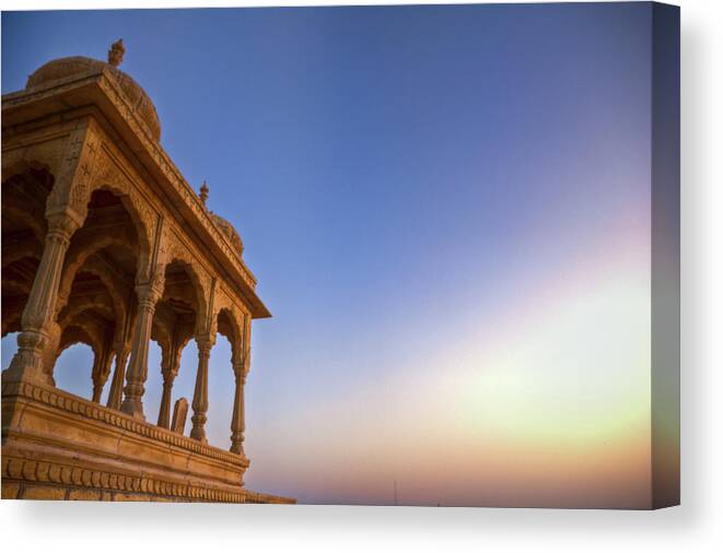 Arch Canvas Print featuring the photograph Sunset By The Cenotaph, Jaisalmer by Palashmitter