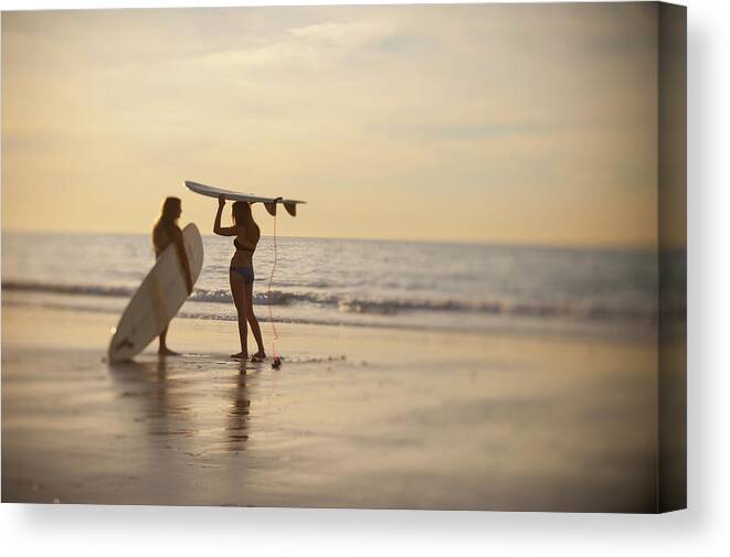 Adolescence Canvas Print featuring the photograph Teen Girls With Surfboards Discussing by Stephen Simpson