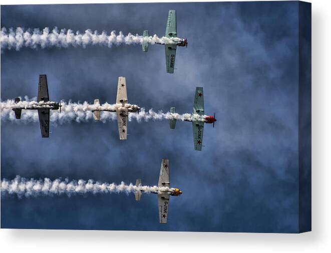 Airplane Canvas Print featuring the photograph The Aerostars by Knut Saglien