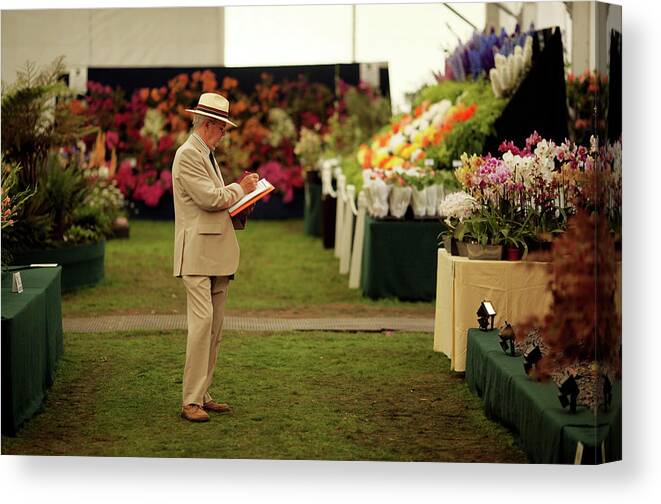 Hampton Court Flower Show Canvas Print featuring the photograph The Annual Hampton Court Flower Show Is by Oli Scarff