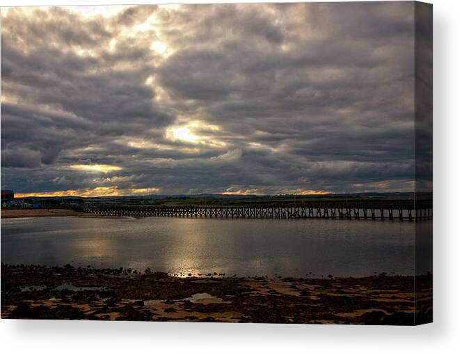 Pier Canvas Print featuring the photograph The Pier At Amble On A Cloudy Evening by Jeff Townsend