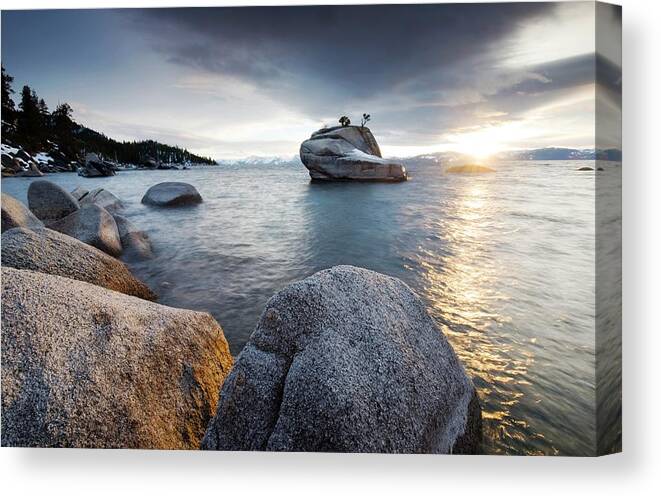 Tranquility Canvas Print featuring the photograph The Sunset Reflects Off Of Lake Tahoe by Rachid Dahnoun