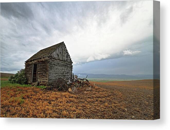 Idaho Canvas Print featuring the photograph Thompson Road Cabin and Storm - Downey, Idaho by Brett Pelletier