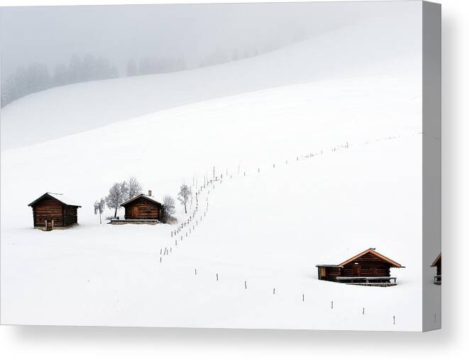 Snow Canvas Print featuring the photograph Three Huts, Snow by Vito Miribung