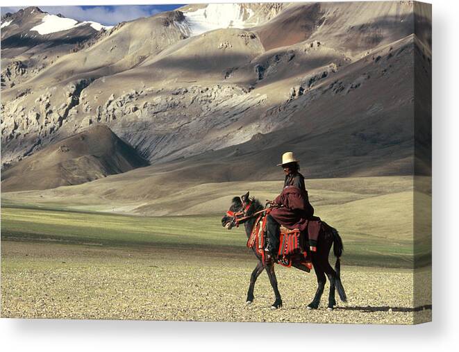 Tibetan Autonomous Region (tar ) Rider Canvas Print featuring the photograph Tibetan Rider by Myriam Leplat