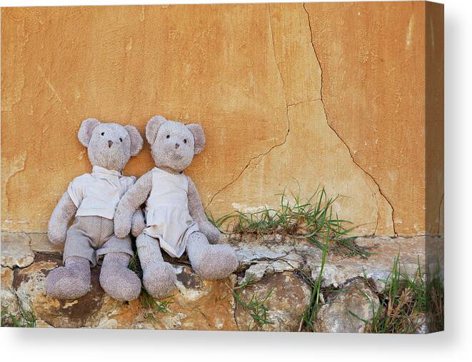 Leaning Canvas Print featuring the digital art Toy Bears Sitting On Wall Outdoors by Gretamarie