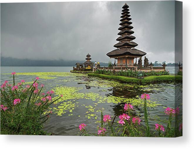Tranquility Canvas Print featuring the photograph Ulun Danu Temple With Flowers And Water by Andrew Tb Tan