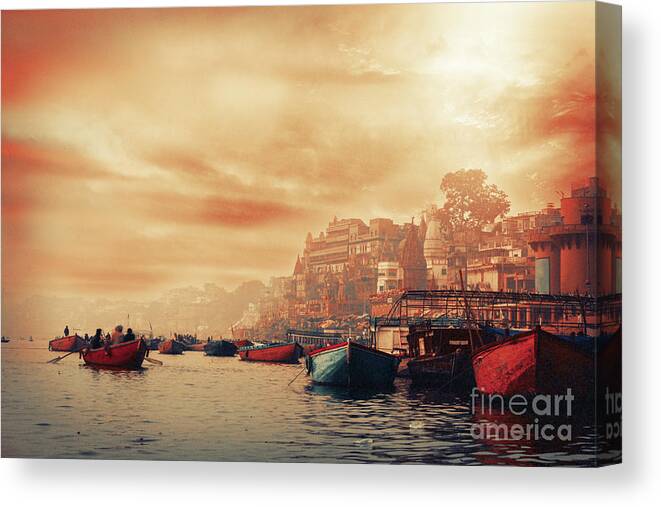 Varanasi Canvas Print featuring the photograph Varanasi - Ganges river at sunrise by Stella Levi